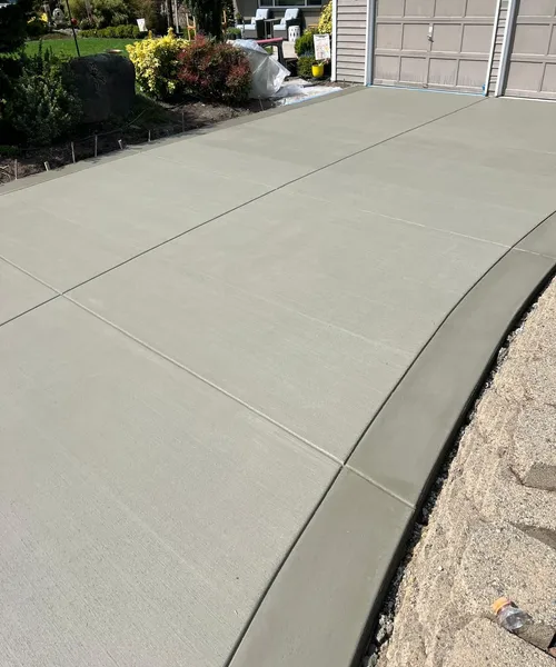 Broom Finish Driveway With Decorative Borders in Edmonds 